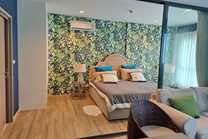 Shady + Tropical Rain Forest style condo