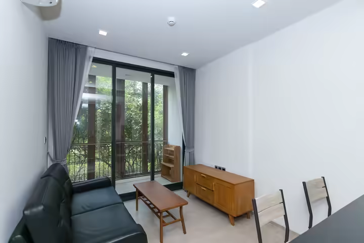 Resort style condo embraced by big trees