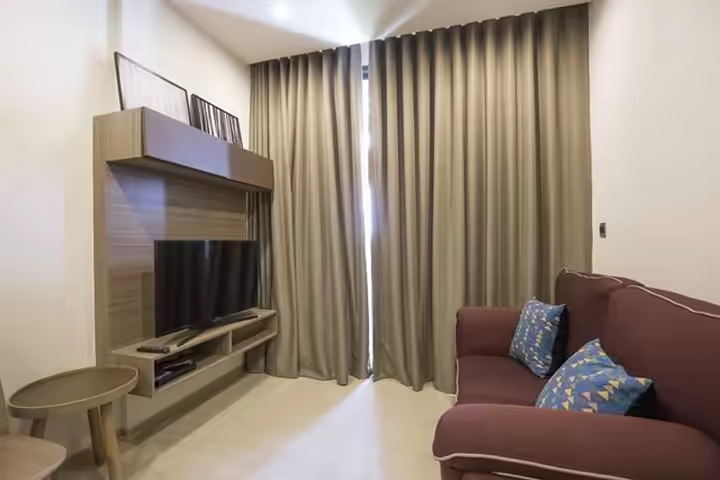 Resort Style Condo Embraced by Big Trees