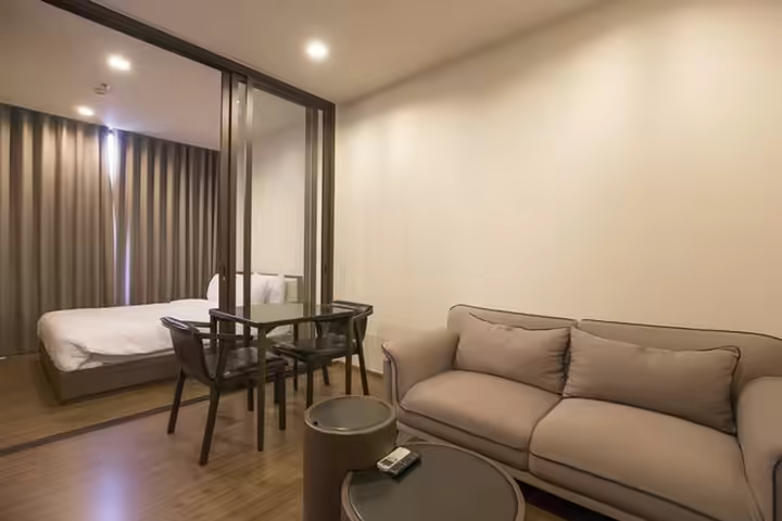 Condo with musical pool + rooftop garden